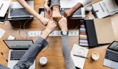 Colleagues giving a fist bump